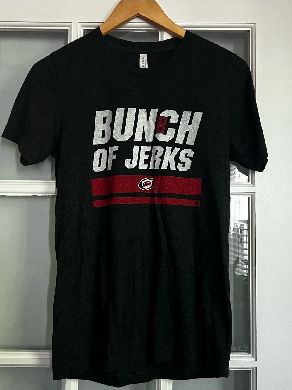 NHL Black 'Bunch of Jerks' Graphic Tee with Red Accents